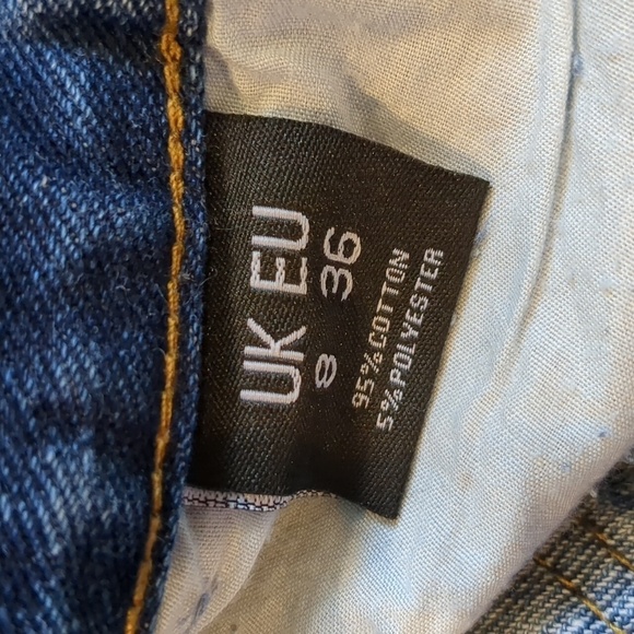 Nasty Gal Rip Em Off Distressed Denim Shorts in Mid Blue Wash - Picture 3 of 5